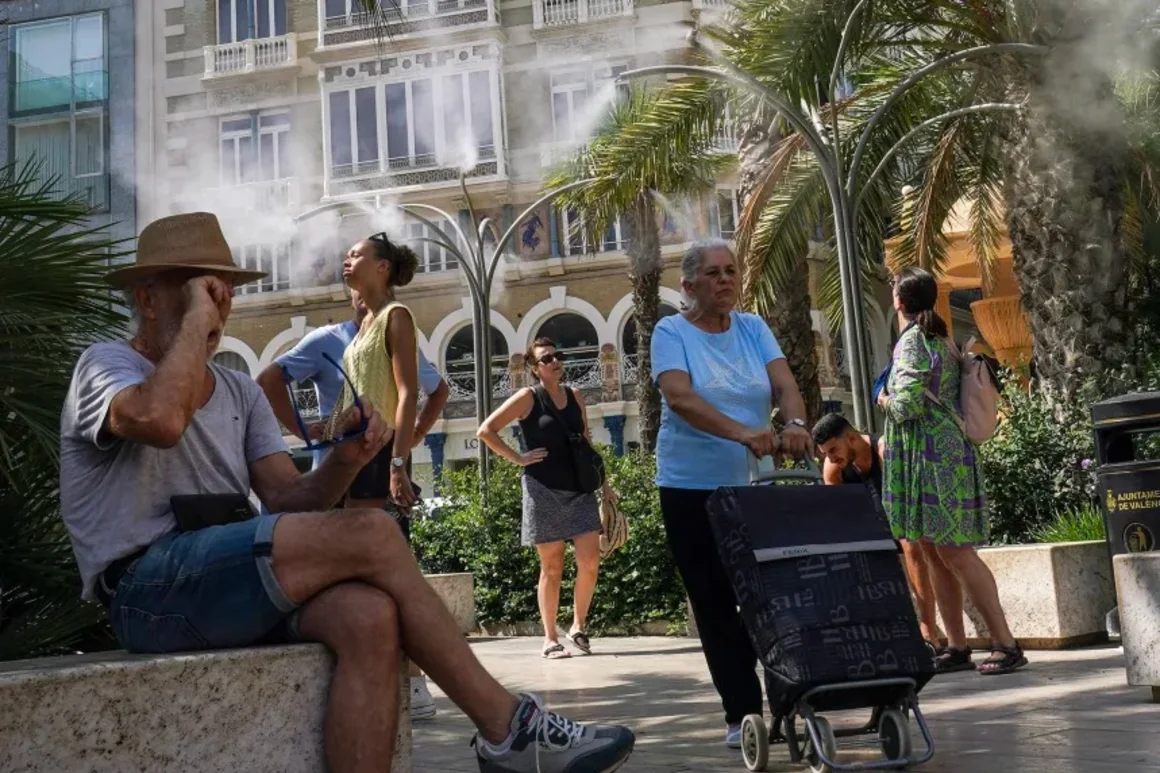 La gente aprovecha las fuentes de agua en Valencia, España, el 21 de junio de 2025, mientras algunas partes del país experimentan una ola de calor. Michael Robinson Chávez/Getty Images